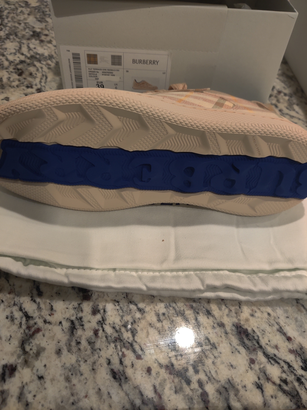 Women's Burberry Check Runner Sneakers. One Pair Is Pink Other is Teal